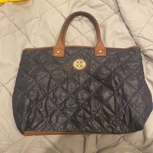 used real navy brown and gold tori burch bag in good condition